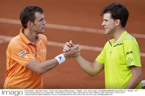TENNIS - ATP, French Open 2014 PARIS,FRANKREICH,26.MAI.14 - TENNIS - ATP Tennis Herren World Tour, Grand Slam, Roland Garros, French Open. Bild zeigt Paul-Henri Mathieu (FRA) und Dominic Thiem (AUT). 