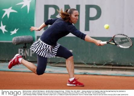 PARIS, May 26, 2014 - Jelena Jankovic of Serbia returns the ball during the Women s Singles first round match on day 2 of the French Open at Roland Garros in Paris on May 26, 2014. (Xinhua Wang Lili) (SP)FRANCE-PARIS-TENNIS-FRENCH OPEN-DAY 2 
