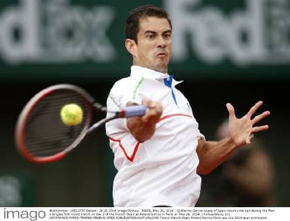 PARIS, May 26, 2014 - Guillermo Garcia-Lopez of Spain returns the ball during the Men s Singles first round match on day 2 of the French Open at Roland Garros in Paris on May 26, 2014. (Xinhua Wang Lili) (SP)FRANCE-PARIS-TENNIS-FRENCH OPEN 