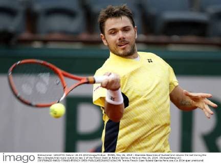 PARIS, May 26, 2014 - Stanislas Wawrinka of Switzerland returns the ball during the Men s Singles first round match on day 2 of the French Open at Roland Garros in Paris on May 26, 2014. (Xinhua Wang Lili) (SP)FRANCE-PARIS-TENNIS-FRENCH OPEN 