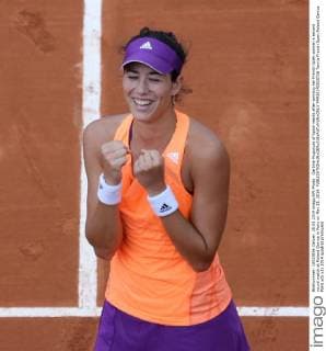Garbine Muguruza of Spain reacts after winning her French Open women s second round match at Roland Garros in Paris on May 28, 2014.  PAR20140528726