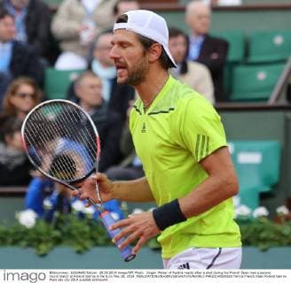 Jürgen Melzer of Austria reacts after a shot during his French Open men s second round match at Roland Garros in Paris on May 28, 2014.  PAR20140528820