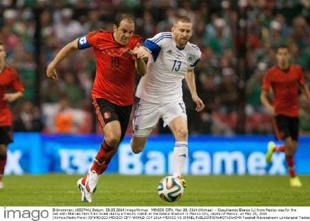 MEXICO CITY, May 28, 2014 (Xinhua) -- Cuauhtemoc Blanco (L) from Mexico vies for the ball with Sherran Yeini from Israel during a friendly match at the Azteca Stadium in Mexico City, capital of Mexico, on May 28, 2014. (Xinhua Pedro Mera) (SP)MEXICO-MEXICO CITY-WORLD CUP 2014-MEXICO VS ISRAEL 