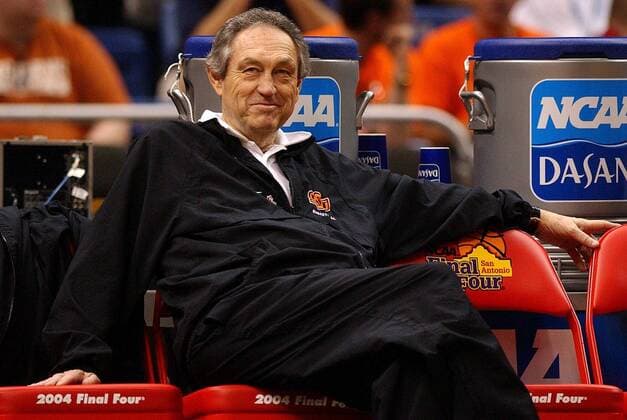 April 3, 2004 - U.S. - 4 2 04 Oklahoma State Cowboys head coach Eddie Sutton smiles as he watches his team run through practice drills at the Alamodome in San Antonio, TX Friday afternoon. Oklahoma State will play the Georgia Tech Yellow Jackets on Saturday in NCAA College League USA National Semifinals action. PATRICK SCHNEIDER STAFF News Archive - April 3, 2004 - ZUMAm67