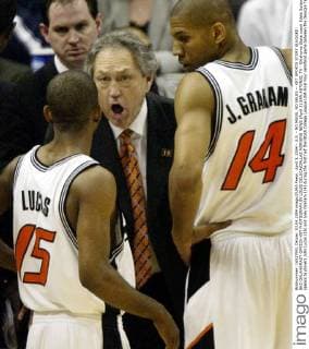 April 3, 2004 - U.S. - NO MAGS, NO SALES -- KRT SPORTS STORY SLUGGED: BKC-OKLAHOMAST-GATECH KRT PHOTOGRAPH BY LOUIS DELUCA DALLAS MORNING NEWS (April 3) SAN ANTONIO, TX - Oklahoma State coach Eddie Sutton speaks to players John Lucas (15) and Joey Graham (14) during the first half the NCAA College League USA Final Four semifinal game between the Georgia Tech Yellow Jackets and Cowboys at the Alamodome, in San Antonio, Texas, Saturday, April 3, 2004. (smd) 2004 News Archive - April 3, 2004 - ZUMAm67