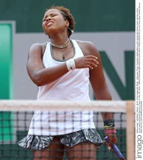 American Taylor Townsend reacts after a shot during her French Open women s third round match at Roland Garros in Paris on May 30, 2014.  PAR20140530740