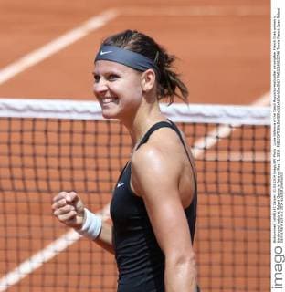 Lucie Safarova of the Czech Republic reacts after winning her French Open women s third round match at Roland Garros in Paris on May 31, 2014.  PAR20140531746