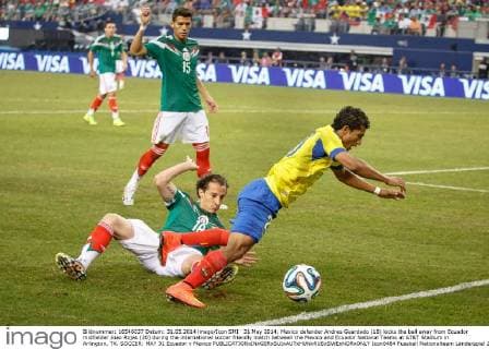 31 May 2014: Mexico defender Andres Guardado (18) kicks the ball away from Ecuador midfielder Joao Rojas (20) during the international soccer friendly match between the Mexico and Ecuador National Teams at AT&T Stadium in Arlington, TX. SOCCER: MAY 31 Ecuador v Mexico Icon0484 EDITORIAL USE ONLY