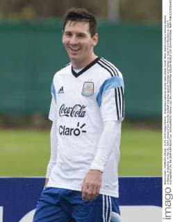 Argentina s national soccer team player Lionel Messi reacts during a training session in Ezeiza, Argentina, on May 31, 2014, ahead of two friendly football matches against Trinidad and Tobago on June 4 and Slovenia on June 7, in preparation for the 2014 FIFA World Cup. (Xinhua Martin Zabala) (jp) (fnc) (SP)ARGENTINA-EZEIZA-WORLD CUP 2014-NATIONAL TEAM 