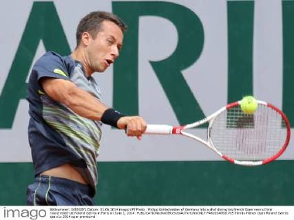 Philipp Kohlschreiber of Germany hits a shot during his French Open men s third round match at Roland Garros in Paris on June 1, 2014.  PAR20140601705