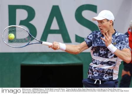 Tomas Berdych of the Czech Republic hits a shot during his French Open men s fourth round match at Roland Garros in Paris on June 1, 2014.  PAR20140601732