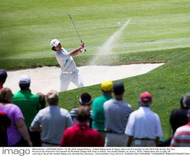 Hideki Matsuyama of Japan chips out of a bunker on the third hole during the final Round of the Memorial Tournament at Muirfield Village Golf Club in Dublin, the United States, on June 1, 2014. Matsuyama won in play off over Kevin Na of the United States and claimed the champion. (Xinhua Shen Ting) (SP)U.S.-DUBLIN-GOLF-MEMORIAL TOURNAMENT 