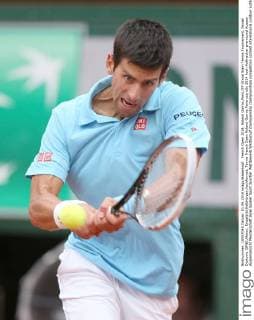French Open 2014, Roland Garros,Paris,ITF Grand Slam Tennis Tournament, Novak Djokovic (SRB),Aktion, Einzelbild,Halbkörper,Hochformat,