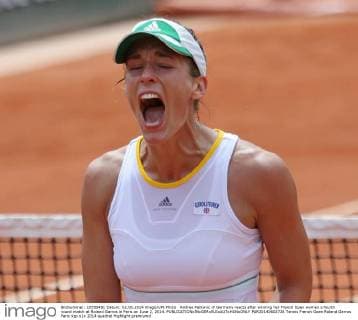 Andrea Petkovic of Germany reacts after winning her French Open women s fourth round match at Roland Garros in Paris on June 2, 2014.  PAR20140602726