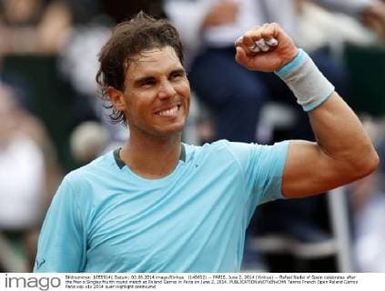 (140602) -- PARIS, June 2, 2014 (Xinhua) -- Rafael Nadal of Spain celebrates after the Men s Singles fourth round match at Roland Garros in Paris on June 2, 2014. 