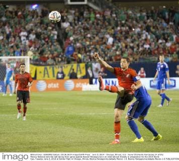 June 3, 2014 - Chicago, Illinois, U.S - Javier Chicharito Hernandez 14 of the Mexico National with the ball during their game against Bosnia-Herzegovina in an international friendly in preparation for the 2014 World Cup, Tuesday June 3, 2014 at Soldier Field in Chicago, Illinois. Bosnia-Herzegovina defeats Mexico 1-0. Bosnia-Herzegovina defeats Mexico 1-0  - ZUMAp12