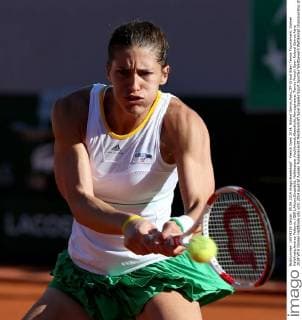 French Open 2014, Roland Garros,Paris,ITF Grand Slam Tennis Tournament, Damen Halbfinale,Andrea Petkovic (GER),Aktion,Einzelbild, Halbkoerper,Hochformat,Abendlicht,Atmosphaere,