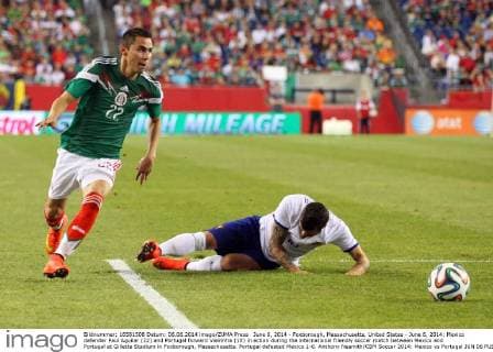 June 6, 2014 - Foxborough, Massachusetts, United States - June 6, 2014: Mexico defender Paul Aguilar (22) and Portugal forward Vieirinha (10) in action during the international friendly soccer match between Mexico and Portugal at Gillette Stadium in Foxborough, Massachusetts. Portugal defeated Mexico 1-0. Anthony Nesmith CSM Soccer 2014: Mexico vs Portugal JUN 06 - ZUMAc04