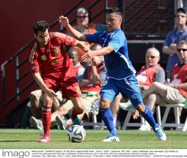 June 7, 2014 - Landover, MD, USA - Spain midfielder Cesc Fabregas (10) battles to control the ball against El Salvador midfielder Richard Menjivar (6) in the first half of an international friendly at FedEx Field in Landover, Md., Saturday, June 7, 2014. International soccer: El Salvador v Spain - ZUMAm67