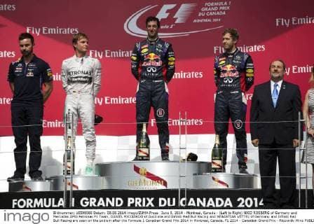 June 8, 2014 - Montreal, Canada - (Left to Right) NICO ROSBERG of Germany and Mercedes AMG Petronas F1 Team, DANIEL RICCIARDO of Australia and Infiniti Red Bull Racing and SEBASTIAN VETTEL of Germany and Infiniti Red Bull Racing are seen on the podium after the Formula 1 Canadian Grand Prix 2014 in Montreal, Canada. F1 2014 - Canadian Grand Prix - Ricciardo Wins  - ZUMAg14