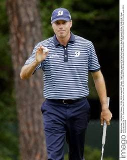 Matt Kucher walks off of the first green in the first round of the 114th U.S. Open at Pinehurst No. 2 in Pinehurst North Carolina on June 12, 2014.  PIN20140612119