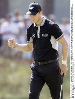 Martin Kaymer reacts after scoring a birdie on the 16th green in the second round of the 114th U.S. Open at Pinehurst No. 2 in Pinehurst North Carolina on June 13, 2014.  PIN20140613106