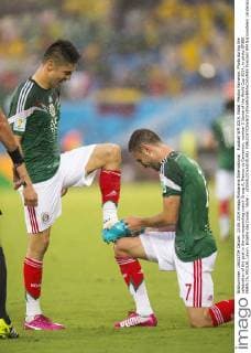 Fussball WM 2014. Natal. Mexiko Kamerun. Photo during the celebration of the goal in the corresponding match Group A, Mexico vs Cameroon, number 2 Game of the World Cup 2014, in photo ORIBE PERALTA, MIGUEL Layun Estadio das Dunas , Natal - xOSVALDOxAGUILARx 