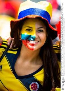 A Colombia s fan poses before a Group C match of 2014 FIFA at the Estadio Mineirao Stadium in Belo Horizonte, June 14, 2014. (Xinhua Liu Bin)(pcy) (SP)BELO HORIZONTE- 2014-GROUP -FANS 