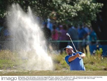 June 14, 2014 - Pinehurst, NC, USA - Brendon De Jonge hits from a sand trap along the 14th fairway during the third round of the 2014 U.S. Open at Pinehurst 2 in Pinehurst, N.C., Saturday, June 14, 2014. 2014 US Open Third Round - ZUMAm67