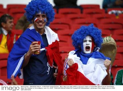 FRA s fans are seen before a Group E match of 2014 FIFA World Cup at the Estadio Beira-Rio Stadium in Porto Alegre, June 15, 2014. 