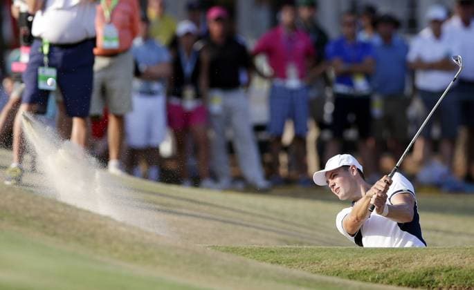 Martin Kaymer hits out of a bunker to the 13th green in the final round of the 114th U.S. Open at Pinehurst No. 2 in Pinehurst North Carolina on June 15, 2014. Kaymer wins the 2014 U.S. Open with a score of 9 under par and a 4 day total of 271.  PIN20140615122
