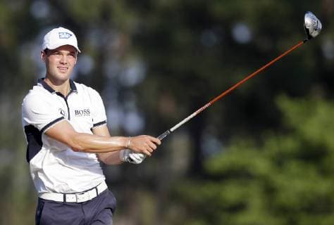 Martin Kaymer tees off on the 13th hole in the final round of the 114th U.S. Open at Pinehurst No. 2 in Pinehurst North Carolina on June 15, 2014. Kaymer wins the 2014 U.S. Open with a score of 9 under par and a 4 day total of 271.  PIN20140615124