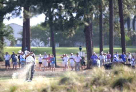 Martin Kaymer hits a tee shot on the 12th hole in the final round of the 114th U.S. Open at Pinehurst No. 2 in Pinehurst North Carolina on June 15, 2014. Kaymer wins the 2014 U.S. Open with a score of 9 under par and a 4 day total of 271.  PIN20140615128