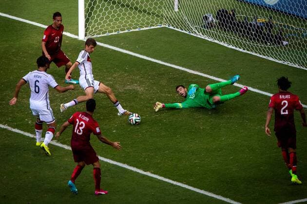 (140616) -- SALVADOR, June 16, 2014 (Xinhua) -- Germany s Thomas Muller shoots his third goal during a Group G match between Germany and Portugal of 2014 FIFA World Cup at the Arena Fonte Nova Stadium in Salvador, Brazil, June 16, 2014. (Xinhua Liu Bin)(rh) (SP)BRAZIL-SALVADOR-WORLD CUP 2014-GROUP G-GERMANY VS PORTUGAL 