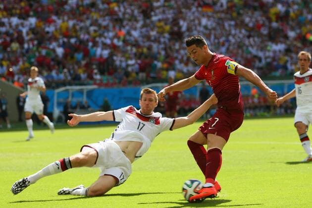(L to R) Per Mertesacker (GER), Cristiano Ronaldo (POR), JUNE 16, 2014 - Football Soccer : 2014 FIFA World Cup Brazil Group Match -Group G- between Germany 4-0 Portugal at Arena Fonte Nova, Salvador, Brazil. Noxthirdxpartyxsales  (mrva097381)