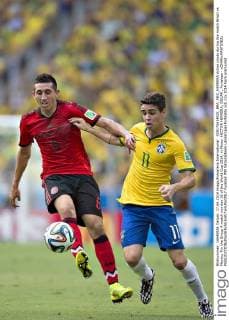005170614RDI_BRA_MEX_HERRERA Action photo during the match Brazil vs Mexico, For the Group A match number 16 of the World Cup 2014, in Photo: HECTOR HERRERA, OSCAR , Fortaleza - xOMARxMARTINEZx 