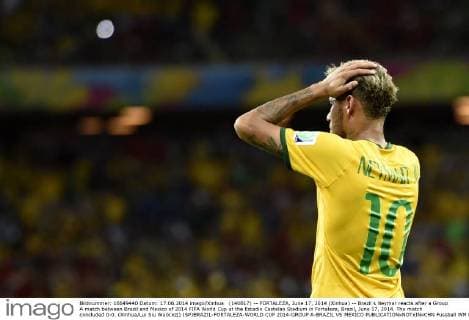(140617) -- FORTALEZA, June 17, 2014 (Xinhua) -- Brazil s Neymar reacts after a Group A match between Brazil and Mexico of 2014 FIFA World Cup at the Estadio Castelao Stadium in Fortaleza, Brazil, June 17, 2014. The match concluded 0-0. (Xinhua Lui Siu Wai)(xzj) (SP)BRAZIL-FORTALEZA-WORLD CUP 2014-GROUP A-BRAZIL VS MEXICO 