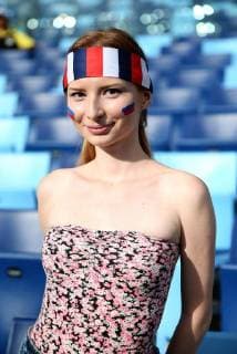 (140617) -- CUIABA, June 17, 2014 (Xinhua) -- A Russia s fan poses before a Group H match of 2014 FIFA World Cup at the Arena Pantanal Stadium in Cuiaba, June 17, 2014.(Xinhua Li Ming)(pcy) (SP)BRAZIL-CUIABA-WORLD CUP 2014-GROUP H-FANS 