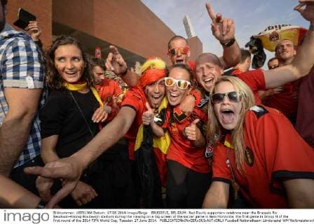 BRUSSELS, BELGIUM: Red Devils supporters celebrate near the Brussels Roi Baudouin-Koning Boudewijn stadium during the viewing on a big screen of the soccer game in Belo Horizonte, the first game in Group H of the first round of the 2014 FIFA World Cup, Tuesday 17 June 2014. 