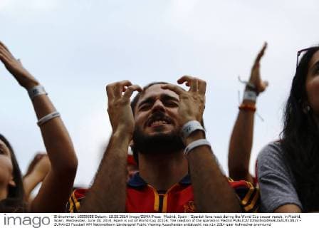 Madrid, Spain - Spanish fans react during the World Cup soccer match, in Madrid, Spain, Wednesday, June 18, 2014. Spain is out of World Cup 20114. The reaction of the spanish in Madrid  - ZUMAn23