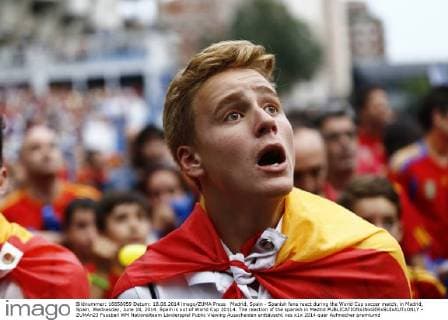 Madrid, Spain - Spanish fans react during the World Cup soccer match, in Madrid, Spain, Wednesday, June 18, 2014. Spain is out of World Cup 20114. The reaction of the spanish in Madrid  - ZUMAn23