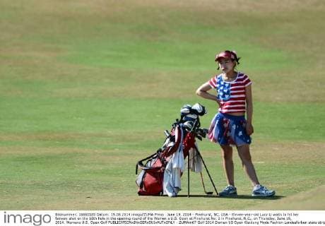June 19, 2014 - Pinehurst, NC, USA - Eleven-year-old Lucy Li waits to hit her fairway shot on the 16th hole in the opening round of the Women s U.S. Open at Pinehurst No. 2 in Pinehurst, N.C., on Thursday, June 19, 2014. Womens U.S. Open Golf - ZUMAm67