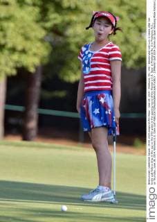 June 19, 2014 - Pinehurst, NC, USA - Eleven-year-old Lucy Li reacts after her birdie putt fails to drop in the cup on the 17th green in the opening round of the Women s U.S. Open at Pinehurst No. 2 in Pinehurst, N.C., on Thursday, June 19, 2014. Womens U.S. Open Golf - ZUMAm67