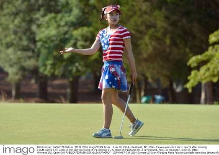 June 19, 2014 - Pinehurst, NC, USA - Eleven-year-old Lucy Li reacts after missing a putt on the 13th green in the opening round of the Women s U.S. Open at Pinehurst No. 2 in Pinehurst, N.C., on Thursday, June 19, 2014. Womens U.S. Open Golf - ZUMAm67