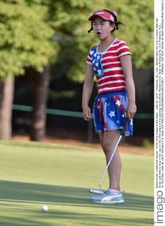 June 19, 2014 - Pinehurst, NC, USA - Eleven-year-old Lucy Li reacts after her birdie putt fails to drop in the cup on the 17th green in the opening round of the Women s U.S. Open at Pinehurst No. 2 in Pinehurst, N.C., on Thursday, June 19, 2014. Womens U.S. Open Golf - ZUMAm67