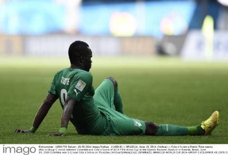 (140619) -- BRASILIA, June 19, 2014 (Xinhua) -- Cote d Ivoire s Cheick Tiote reacts after a Group C match between Colombia and Cote d Ivoire of 2014 FIFA World Cup at the Estadio Nacional Stadium in Brasilia, Brazil, June 19, 2014.Colombia won 2-1 over Cote d Ivoire on Thursday.(Xinhua Qi Heng)(xzj) (SP)BRAZIL-BRASILIA-WORLD CUP 2014-GROUP C-COLOMBIA VS COTE D IVOIRE 