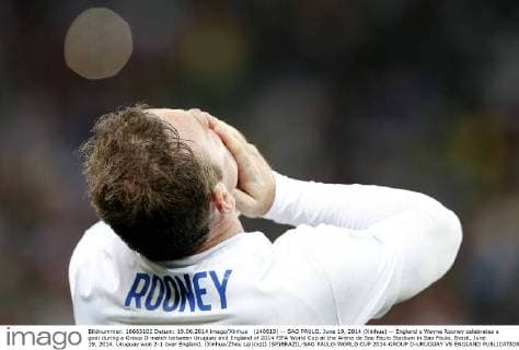 (140619) -- SAO PAULO, June 19, 2014 (Xinhua) -- England s Wayne Rooney celebrates a goal during a Group D match between Uruguay and England of 2014 FIFA World Cup at the Arena de Sao Paulo Stadium in Sao Paulo, Brazil, June 19, 2014. Uruguay won 2-1 over England. (Xinhua Zhou Lei)(xzj) (SP)BRAZIL-SAO PAULO-WORLD CUP 2014-GROUP D-URUGUAY VS ENGLAND 