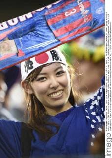 (140619) -- NATAL, June 19, 2014 (Xinhua) -- Japan s fan cheers during a Group C match of 2014 FIFA World Cup at the Estadio das Dunas Stadium in Natal June 19, 2014.(Xinhua Lui Siu Wai)(xzj) (SP) NATAL-WORLD CUP 2014-GROUP C 