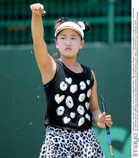 The youngest ever Women s U.S. Open competitor, 11-year-old Lucy Li, a 6th grader from Redwood Shores, California, drives hole one during Round Two of the Women s U.S. Open at Pinehurst No. 2, in Pinehurst, North Carolina, on June 20, 2014.  PIN2014062013