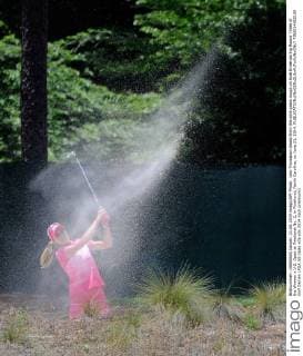 Lexi Thompson blasts from the wire grass rough on hole three during Round Three of the Women s U.S. Open at Pinehurst No. 2, in Pinehurst, North Carolina, on June 21, 2014.  PIN2014062108